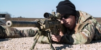 Soldier firing a M110 Semi-Automatic Sniper System Soldier firing a M110 Semi-Automatic Sniper System